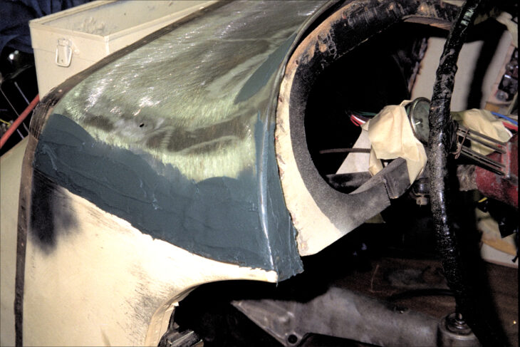 Body putty on the cowl (wet)