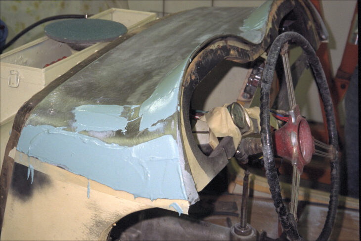 Body putty on cowl (dried)